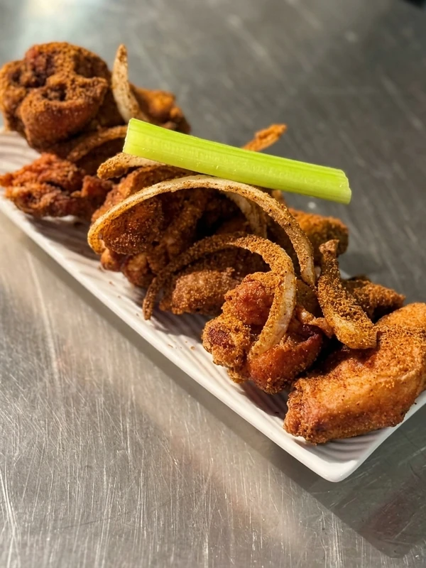 Nigerian gizz-dodo, peppered gizzard with fried plantain, at Lagos Flavors in Edmonton, AB
