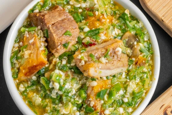Nigerian okra soup and swallow served at Lagos Flavors, a Nigerian restaurant in Edmonton, AB