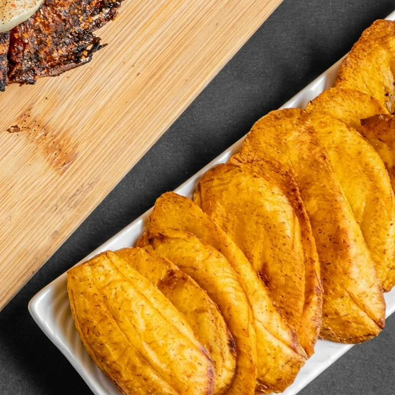 Golden Nigerian fried plantain dodo at Lagos Flavors in Queen Mary Park, Edmonton, AB